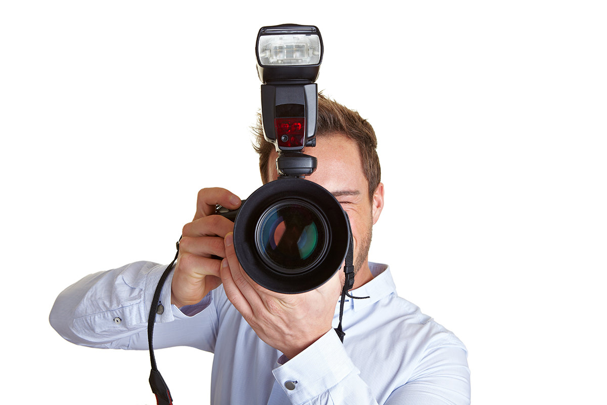 Teilnehmer im Fotokurs lernen den kreativen Einsatz von Aufsteckblitzen
